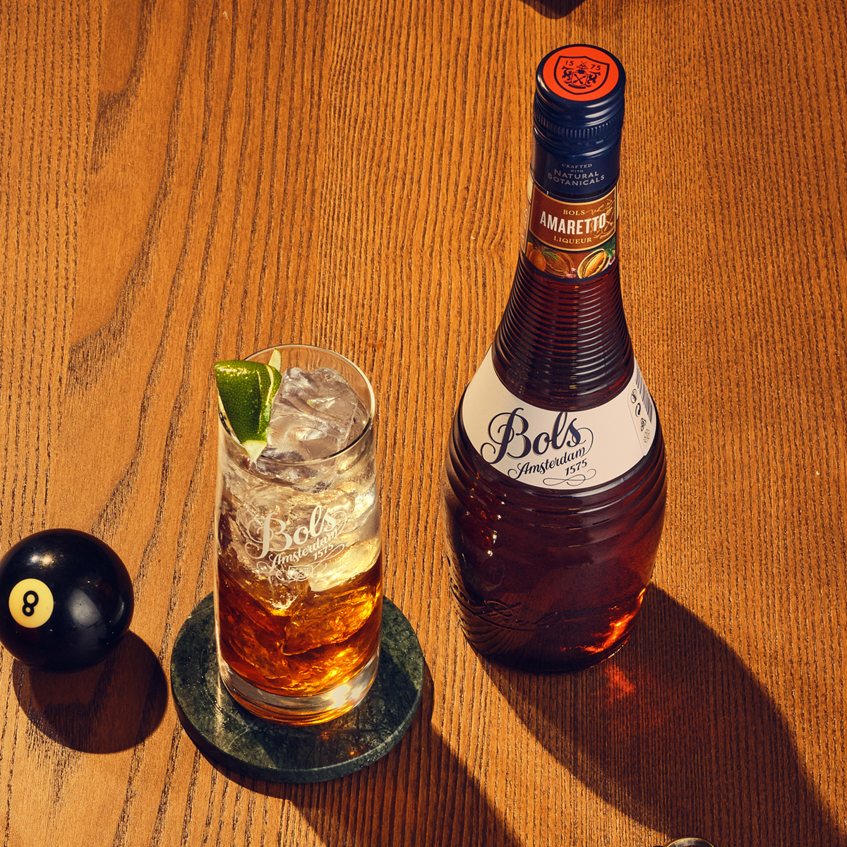 amaretto cocktail in highball glass made with bols amaretto liqueur