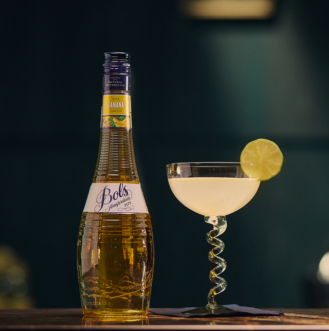 banana cocktail in a coupe made with bols banana liqueur